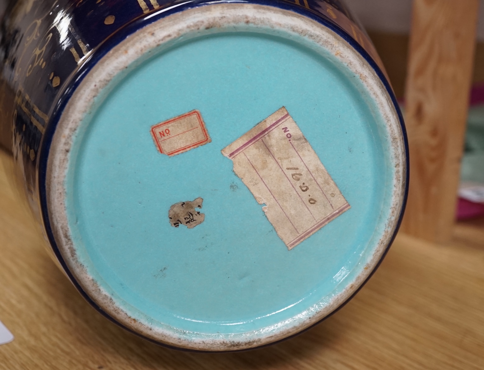 A Chinese gilt decorated blue glazed vase, early 19th century, 48.5cm high. Condition - one side has a large oval break which as been reglued, the gilt decoration is rubbed